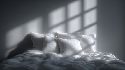 Soft Bed with White Pillows and Natural Light Shadows on Wall