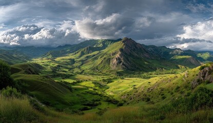 Fototapeta premium Lush green valley unfolds beneath a dramatic sky, mountains in the distance