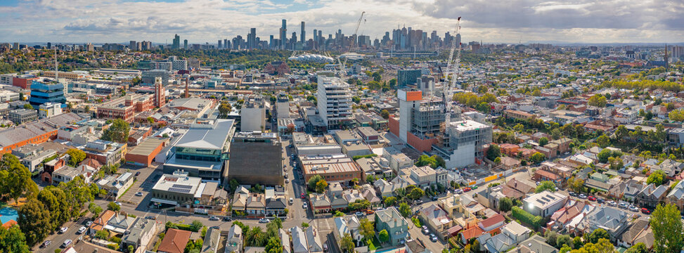 Aerial panorama view of a widespread sububan city with a distant skyline