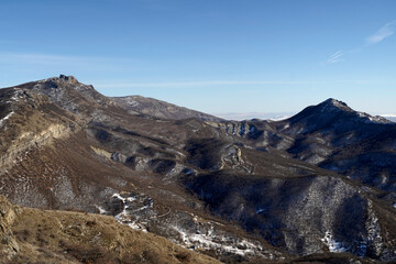 Snowy Caucasus Mountains Landscape with Deciduous Winter Forest in Georgia