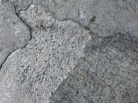 Rough Gray Concrete Surface with Grungy Cracks Texture