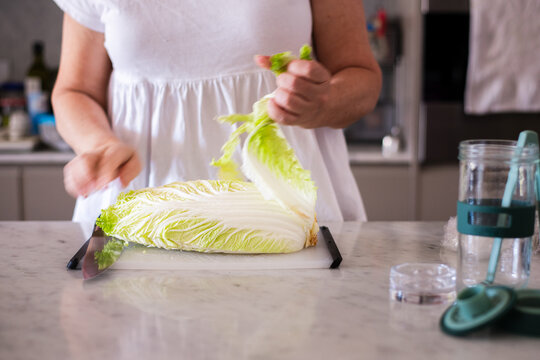 woman making sauerkraut