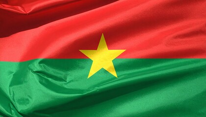 Burkina Faso national flag with red and green stripes and central yellow star symbolizing revolution and hope.