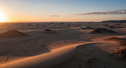 Panoramic Desert Landscape at Sunrise with Rolling Sand Dunes and Cloudless Blue Sky expanse