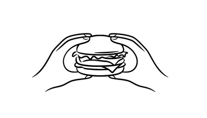A person holding a large burger in their hands silhouette
