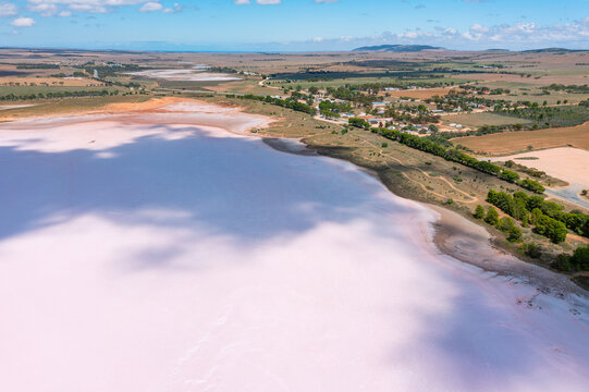 Aerial view of shadow patterns over a colourful salt lake