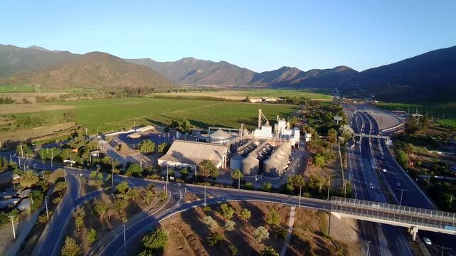 Alimentary industry with silos arround vineyards