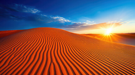 Warm Desert Dunes Under Vibrant Blue Sky During Golden Hour