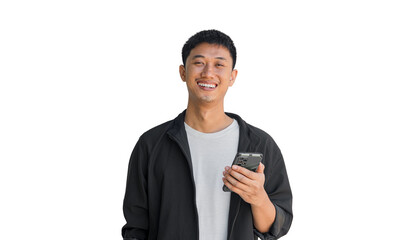 A young man holding a phone is smiling happily, isolated on a white background.