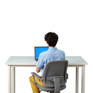 Young man working on laptop at desk