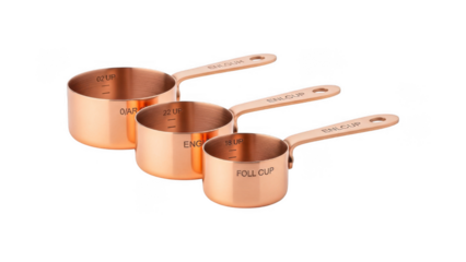 Copper measuring cups set of three with engraved measurements on handles isolated on transparent background