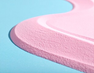 Abstract Pastel Pink Granular Sponge Texture with Wavy Curve on Light Blue Background