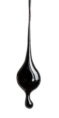 Heavy oil drop in motion isolated on white, representing pollution, industry, or environmental impact