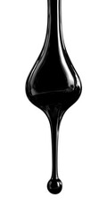 Heavy oil drop in motion isolated on white, representing pollution, industry, or environmental impact