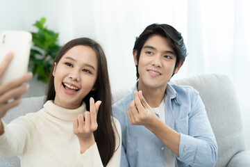 Obraz premium couple family smile and happy activity together, cuddling, warm hugs, young love, married couple, warm family. Husband and wife in love so fun in important days, celebrating