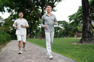 Asia elderly man run outdoor