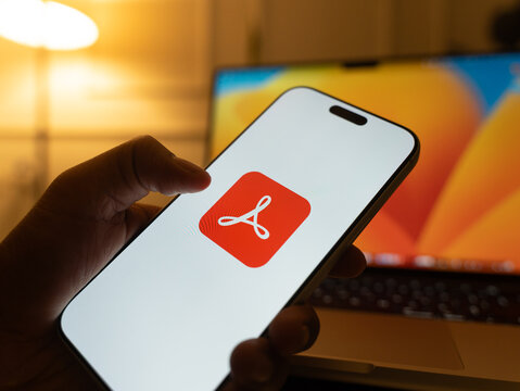 Adobe Acrobat Reader logo is displayed on the screen of a smartphone, in Bangalore, India, on January 06, 2026