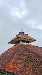 Mosque roof with cloud background after rain
