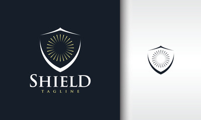 Elegant Shield Logo with Radiant Sunburst