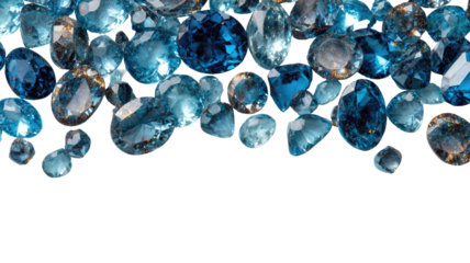 Pile of faceted, blue and azure gemstones on black ground