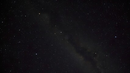 Elegant, luminous chains of star clusters weaving through the velvet blackness of space like a celestial necklace.