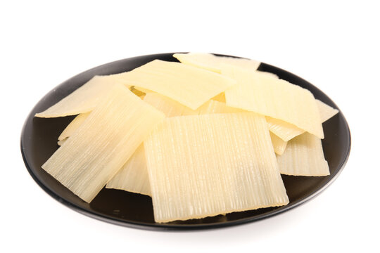 Fresh Sliced Bamboo Shoots on Black Plate - Healthy Asian Ingredient