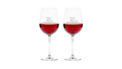 Two elegant wine glasses filled with red wine on transparent background