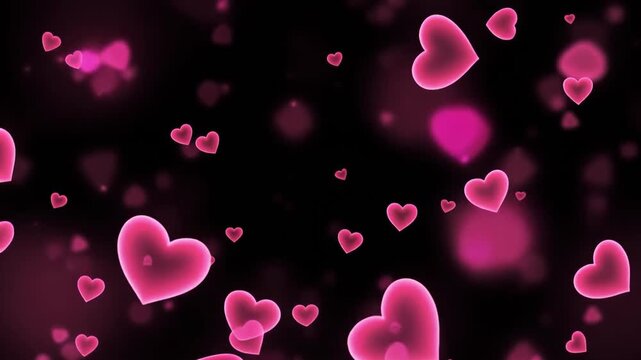 Pink hearts floating on dark background with bokeh effect for Valentine's Day or love-themed greeting card