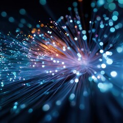 Naklejka premium Vibrant fiber optic cables with glowing blue and orange lights