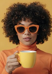 Retro-style portrait with orange sunglasses and yellow mug on monochrome yellow background