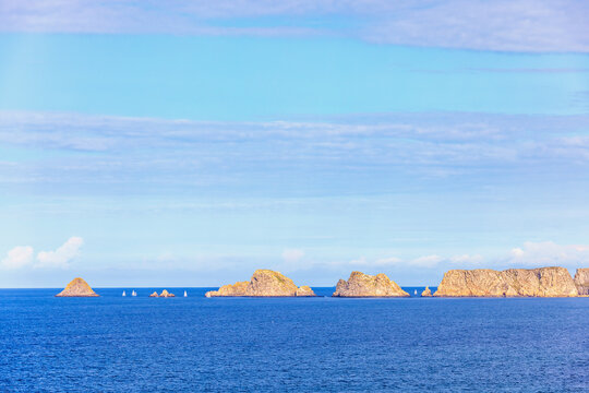 Seascape view with sailboats outside at Pointe de pen-hir on the Bretagne coast