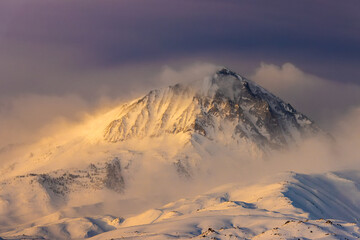 snowy winter sunrise in the Sierra Nevada mountains