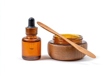 Skincare set serum bottle & cream jar w/ spatula on white