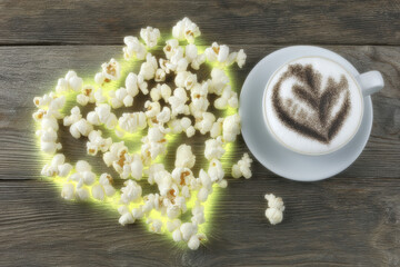 Popcorn heart on wooden table with cappuccino cup and latte art, cozy snack and romantic mood