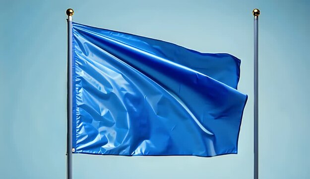 A Vibrant Blue Flag Ripples Majestically Against a Soft Sky Background on a Sunny Day