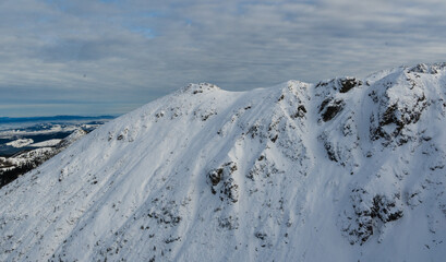 mountain peak, snow-capped winter rocks, snow Kasprowy Wierch, Poland