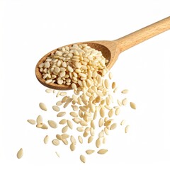 Ivory seeds spill from a wooden spoon, isolated against a white background