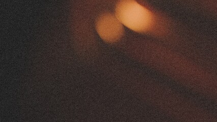 glowing color wave of dark yellow on black backdrop for wallpaper design, of a grain texture