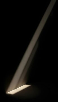 An intense diagonal slash of light cuts the void, creating a sense of inevitable movement ,  energy,  void