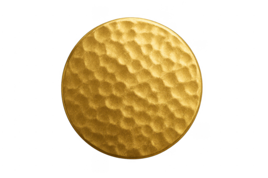 Golden hammered metal disc with textured surface - Powered by Adobe