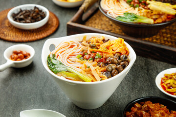 Gourmet Asian Noodle Bowl with Snails and Pickled Ingredients