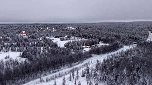 Santa Claus Village forest in winter, Rovaniemi, Lapland, Aerial