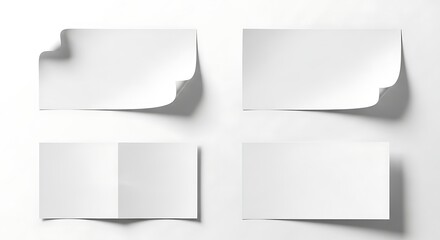 Four blank white paper sheets mockup template displaying curled and folded corners creating subtle shadows on a bright clean surface for design element presentation