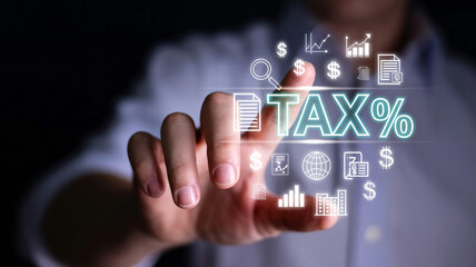 A businessman interacting with a digital tax percentage interface with financial icons