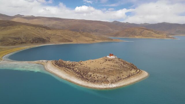 Drone Circle View of Yamdrok Lake and Surrounding Mountains in Tibet, China
