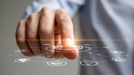 A person's hand interacting with a futuristic digital interface with glowing icons