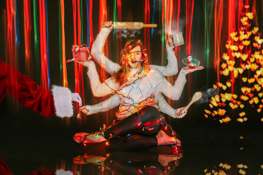 Woman with Multiple Hands Wrapped Up in Lights