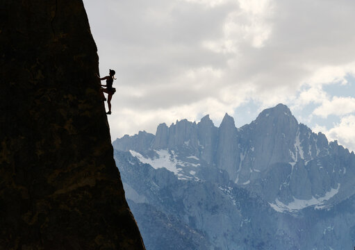 Climbers Silhouetted in Alabama Hills Against Mt. Whitney