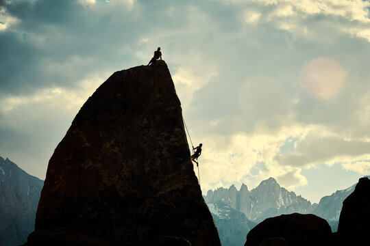 Climbers Silhouetted in Alabama Hills Against Mt. Whitney
