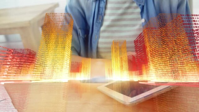 Animation of 3d building structures over mid section of caucasian woman using digital tablet